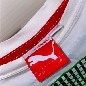 White, green, & black Pumas boy XL T-shirt